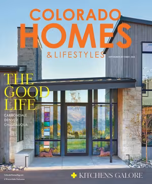 Magazine cover with a modern house exterior and large windows.