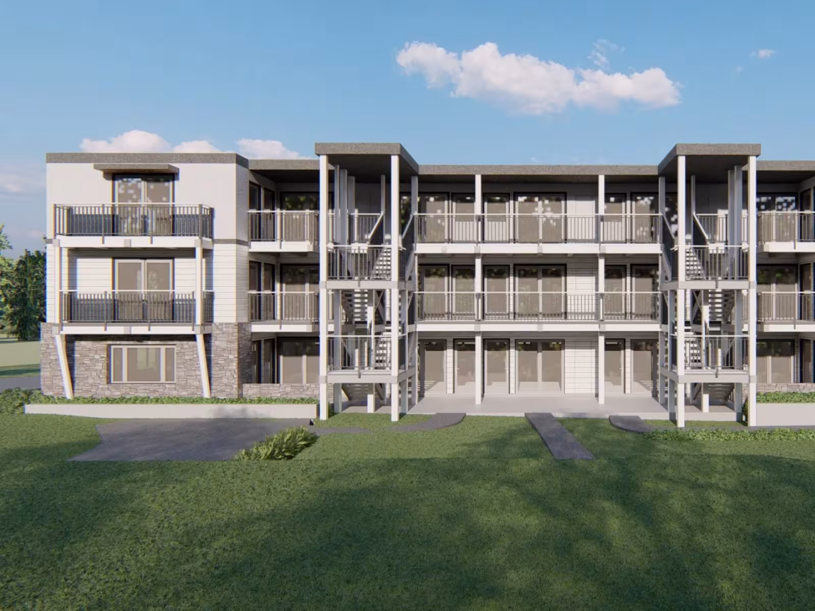 Modern apartment building with balconies, set against a blue sky.
